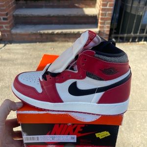 - Nike Air Jordan 1 retro high OG big kids size 6.5Y red and white